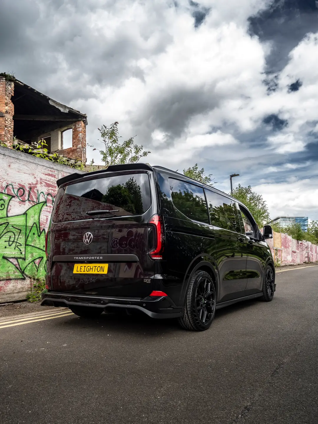 Black VW Transporter T7 kombi from the rear