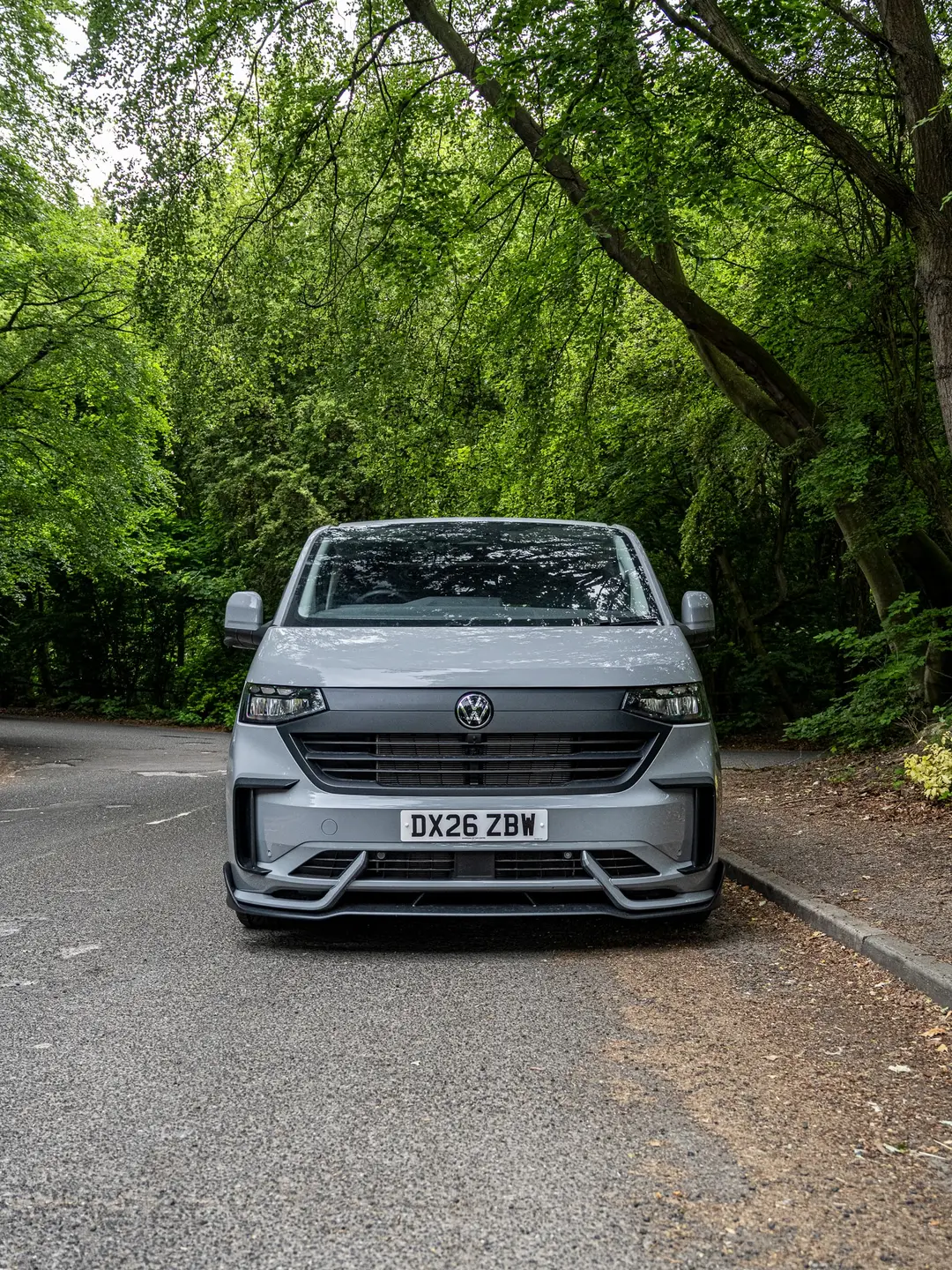 Grey VW Transporter T7 panel van, head on